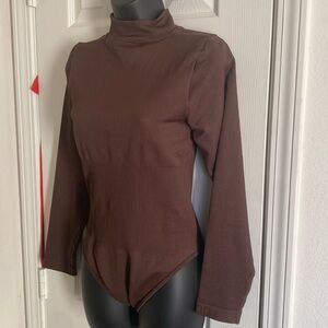Zip up bodysuit black and brown included